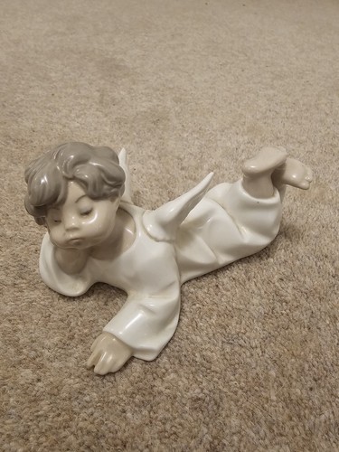 Lladro angel laying down - laying, down’