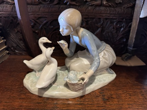 Lladro feeding the - feeding, ducks