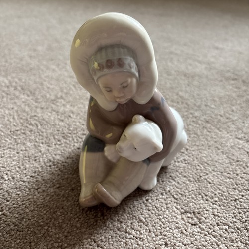 Lladro eskimo with - with, bear