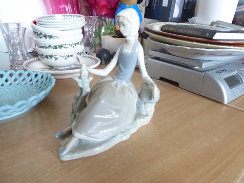Lladro lady with bird