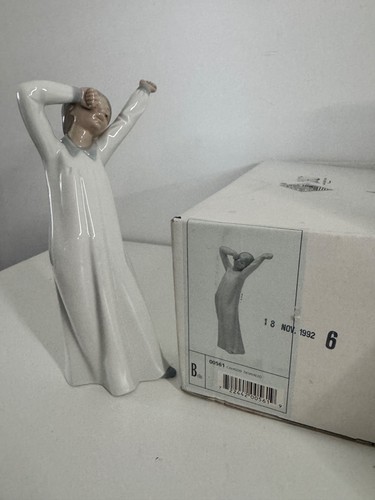 Nao lladro girl yawning - by, 'girl
