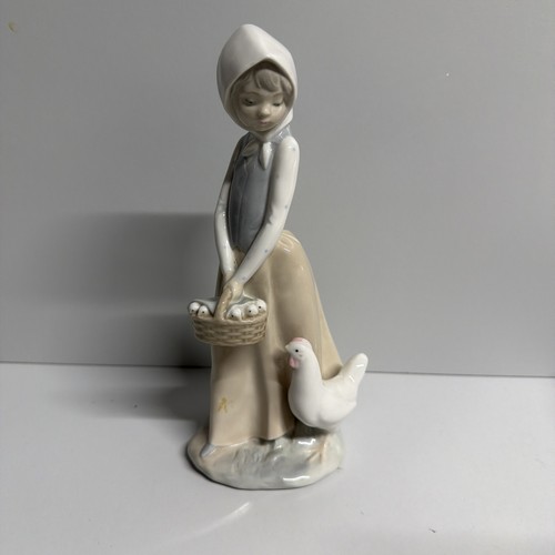 Nao lladro figurine - by,