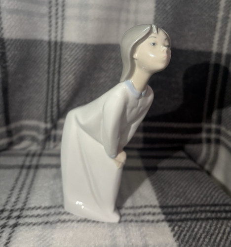 Lladro kissing girl porcelain