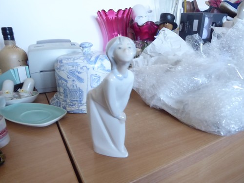 Lladro lady bent over