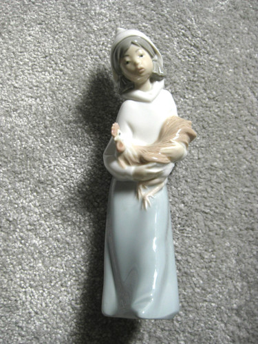 Lladro girl holding chicken - girl,