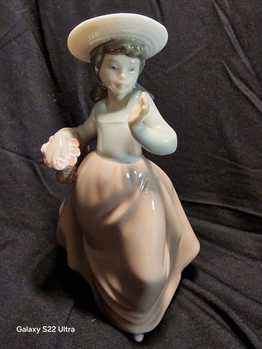 Nao lladro out for stroll - by,