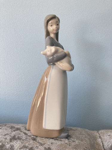 Lladro girl with piglet - girl,