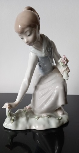 Lladro girl picking flowers - girl,