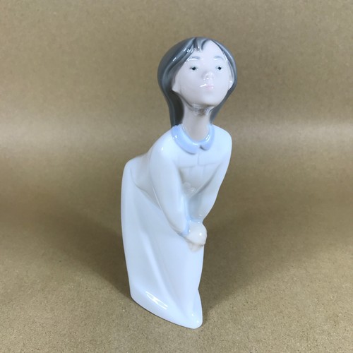 Lladro girl kissing figurine - kissing,