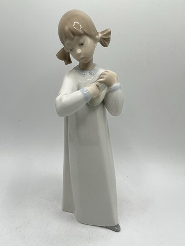 Lladro girl playing damaged - girl,