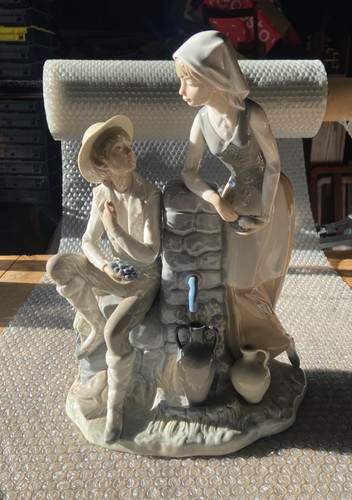 Nao lladro figurine - by,