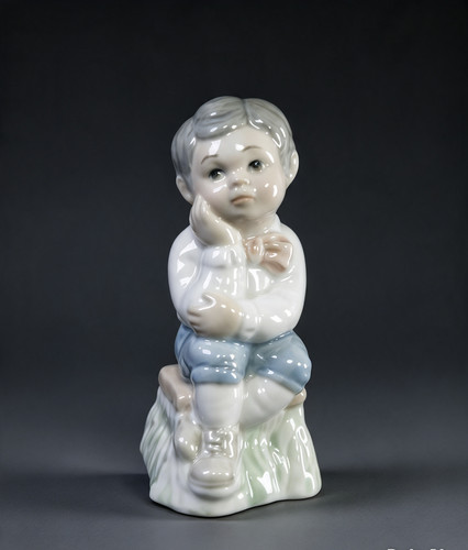 Tengra sitting boy figurine - tengra,
